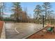 Community basketball court with hoops on each end and a view of the playground and surrounding greenery at 4354 Revere Cir, Marietta, GA 30062