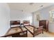 Spacious bedroom featuring carpet flooring, and bright windows that provide ample natural light at 4354 Revere Cir, Marietta, GA 30062