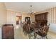 Traditional dining room featuring a wooden table with seating for six and a decorative hutch at 4354 Revere Cir, Marietta, GA 30062