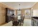 Dining room featuring wallpaper, traditional furniture, chandelier, and natural light at 4354 Revere Cir, Marietta, GA 30062