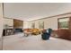 Spacious living room showcasing stone fireplace, carpeted floors, and natural light at 4354 Revere Cir, Marietta, GA 30062