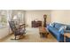 Cozy living room featuring carpet, a large window, and comfortable seating at 4354 Revere Cir, Marietta, GA 30062