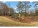 Community playground with multiple slides and climbing structures offers a fun and safe recreational space at 4354 Revere Cir, Marietta, GA 30062