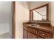 Functional wet bar area with sink, wood cabinets, and pass-through window at 4354 Revere Cir, Marietta, GA 30062