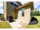 Home backyard with a patio, grill, and a partially screened-in porch at 6110 Read Rd, Suwanee, GA 30024