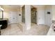 Beautiful bathroom with a glass enclosed shower, dual vanities and & doors at 6110 Read Rd, Suwanee, GA 30024