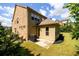 Exterior of home with a patio perfect for outdoor grilling and enjoying backyard views at 6110 Read Rd, Suwanee, GA 30024