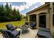 Inviting outdoor patio with comfortable seating and a fire pit at 6110 Read Rd, Suwanee, GA 30024