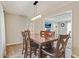 Traditional dining room featuring hardwood floors, neutral paint, and modern light fixture with open floorplan at 3605 Hickory Se Cir, Smyrna, GA 30080