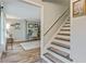 Entryway featuring hardwood floors, staircase leading upstairs and view into a home office at 3605 Hickory Se Cir, Smyrna, GA 30080