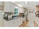 Well-appointed kitchen featuring stainless steel appliances, granite countertops, and ample cabinet space at 3605 Hickory Se Cir, Smyrna, GA 30080