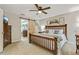 Bedroom featuring wood-slat sliding door, ceiling fan, neutral walls, and carpeted floors at 3605 Hickory Se Cir, Smyrna, GA 30080