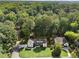Aerial view of a home surrounded by lush greenery, showcasing its location and neighborhood at 3899 Carlton Dr, Chamblee, GA 30341