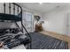 A bedroom with bunk beds, hockey decor, and a dark gray rug at 3899 Carlton Dr, Chamblee, GA 30341