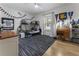 A bedroom with bunk beds, hockey decor, and a modern ceiling fan at 3899 Carlton Dr, Chamblee, GA 30341
