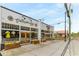 Charming retail space with wooden doors, large windows, and vibrant flower planters for added curb appeal at 3899 Carlton Dr, Chamblee, GA 30341