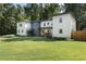 Stunning two-story home with a charming front porch and expansive lawn at 3899 Carlton Dr, Chamblee, GA 30341