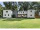 Charming two-story home with a welcoming front porch and lush green lawn at 3899 Carlton Dr, Chamblee, GA 30341