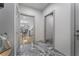 Elegant foyer featuring marble floors and views into the dining and staircase at 3899 Carlton Dr, Chamblee, GA 30341