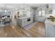Open-concept kitchen with a large island, stainless steel appliances, and hardwood floors at 3899 Carlton Dr, Chamblee, GA 30341