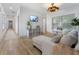 Bright living room featuring a comfortable sectional sofa, natural light and wood flooring at 3899 Carlton Dr, Chamblee, GA 30341