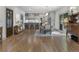 Open living and dining area with hardwood floors, natural light, and access to kitchen at 3899 Carlton Dr, Chamblee, GA 30341