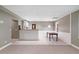 The finished basement features a bar area and dining space, perfect for entertaining guests and Gathering at 501 Avery Creek Pointe, Woodstock, GA 30188