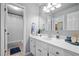 Bright bathroom features a neutral design, a shower/tub, and a vanity with plenty of counter space at 501 Avery Creek Pointe, Woodstock, GA 30188
