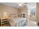 Bright bedroom boasts natural light, neutral paint, and a charming playhouse nook, ideal for a room at 501 Avery Creek Pointe, Woodstock, GA 30188
