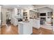 Modern kitchen with a center island, stainless steel appliances and plenty of counter space at 501 Avery Creek Pointe, Woodstock, GA 30188
