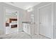 Beautiful bathroom with granite counters, white cabinets, and a glimpse of the primary bedroom at 115 Greenbrier Way, Canton, GA 30114