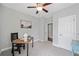 Bright bedroom features neutral carpet, ceiling fan, and natural light at 115 Greenbrier Way, Canton, GA 30114