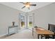 Bright bedroom features two windows, neutral carpeting, and ample natural light at 115 Greenbrier Way, Canton, GA 30114