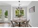 Cozy dining area with a view of the deck and access to the outdoors at 115 Greenbrier Way, Canton, GA 30114