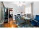 Chic dining room featuring hardwood floors and access to the kitchen and living area at 1776 Fairway Hill Se Dr, Atlanta, GA 30317