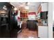 Functional kitchen with modern appliances, tile backsplash, and a window above the sink at 1776 Fairway Hill Se Dr, Atlanta, GA 30317