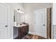 Primary bathroom with vanity and tiled shower, and 3 panel vanity mirror at 3024 Bridgehaven Ct, Snellville, GA 30039