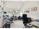 Home office featuring neutral carpeting, natural light, and vaulted ceiling at 3024 Bridgehaven Ct, Snellville, GA 30039