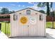 Backyard shed with double doors and rustic Route 66 themed decor at 3024 Bridgehaven Ct, Snellville, GA 30039