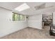 Finished basement offers versatile space with a large window for ample light and views of the outdoors at 4290 Inverness Ne Ct, Roswell, GA 30075
