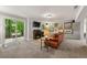 Finished basement with walkout and neutral tones, offering additional living space for relaxation and entertainment at 4290 Inverness Ne Ct, Roswell, GA 30075