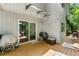 Wooden deck with sliding glass doors, perfect for outdoor grilling and enjoying tranquil natural surroundings at 4290 Inverness Ne Ct, Roswell, GA 30075