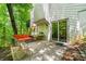 Relaxing patio with comfortable seating and a sliding glass door to blend indoor and outdoor living at 4290 Inverness Ne Ct, Roswell, GA 30075