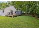 Well-maintained backyard featuring a deck, grill, shed, and lush green ground cover at 439 Atlanta Se Ave, Atlanta, GA 30315