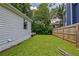 Side yard featuring a well-kept lawn, and fenced boundary ensuring privacy and security at 439 Atlanta Se Ave, Atlanta, GA 30315