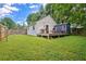 Inviting backyard with a deck, shed, grill and expansive green lawn space, great for gatherings at 439 Atlanta Se Ave, Atlanta, GA 30315