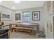 Dining room with a large wooden table, bench, and modern art on the wall at 439 Atlanta Se Ave, Atlanta, GA 30315