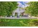 Charming cottage-style home with a beautifully landscaped front yard and inviting outdoor patio at 439 Atlanta Se Ave, Atlanta, GA 30315