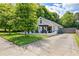 Charming cottage-style home with inviting patio, beautiful landscaping, and a private driveway at 439 Atlanta Se Ave, Atlanta, GA 30315