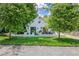 Charming cottage-style home with landscaped lawn, patio, and black trim windows and doors at 439 Atlanta Se Ave, Atlanta, GA 30315